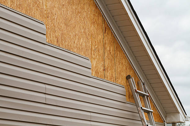 Professional Siding Replacement technician working in North Versailles, PA